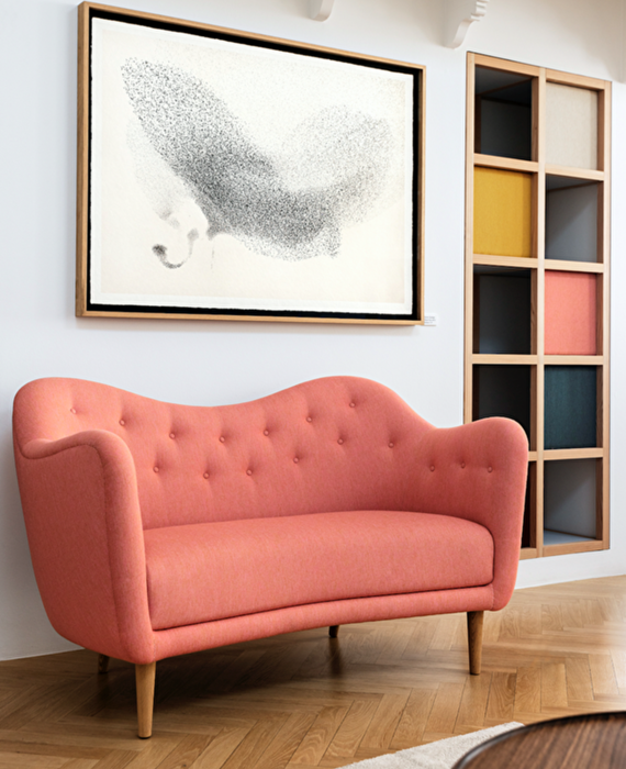 自由に流れるデザインと彫刻のような優美なフォルム『46 sofa